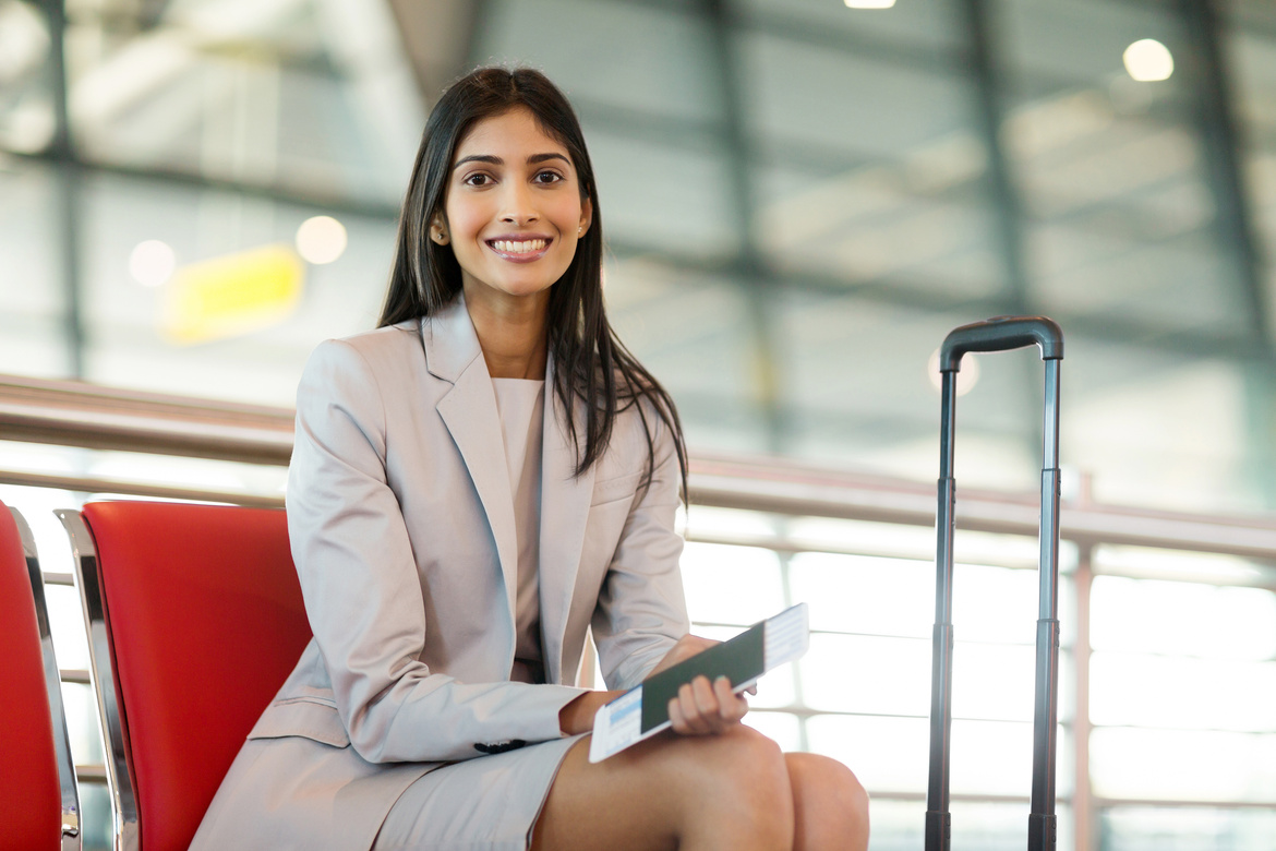 indian business woman waiting at airport